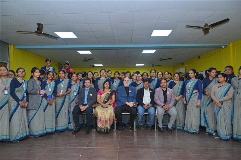 School staff and guests gathered for a group photograph